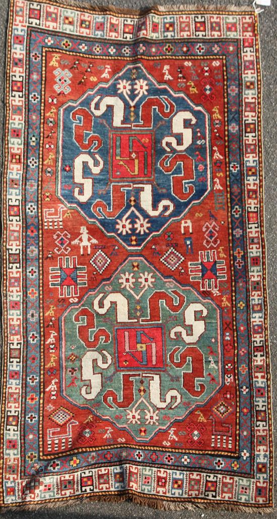 A Kazak red ground rug, c.1885, 7ft 6in by 3ft 11in.